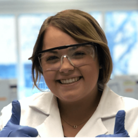 Young lady with glasses working in the lab.