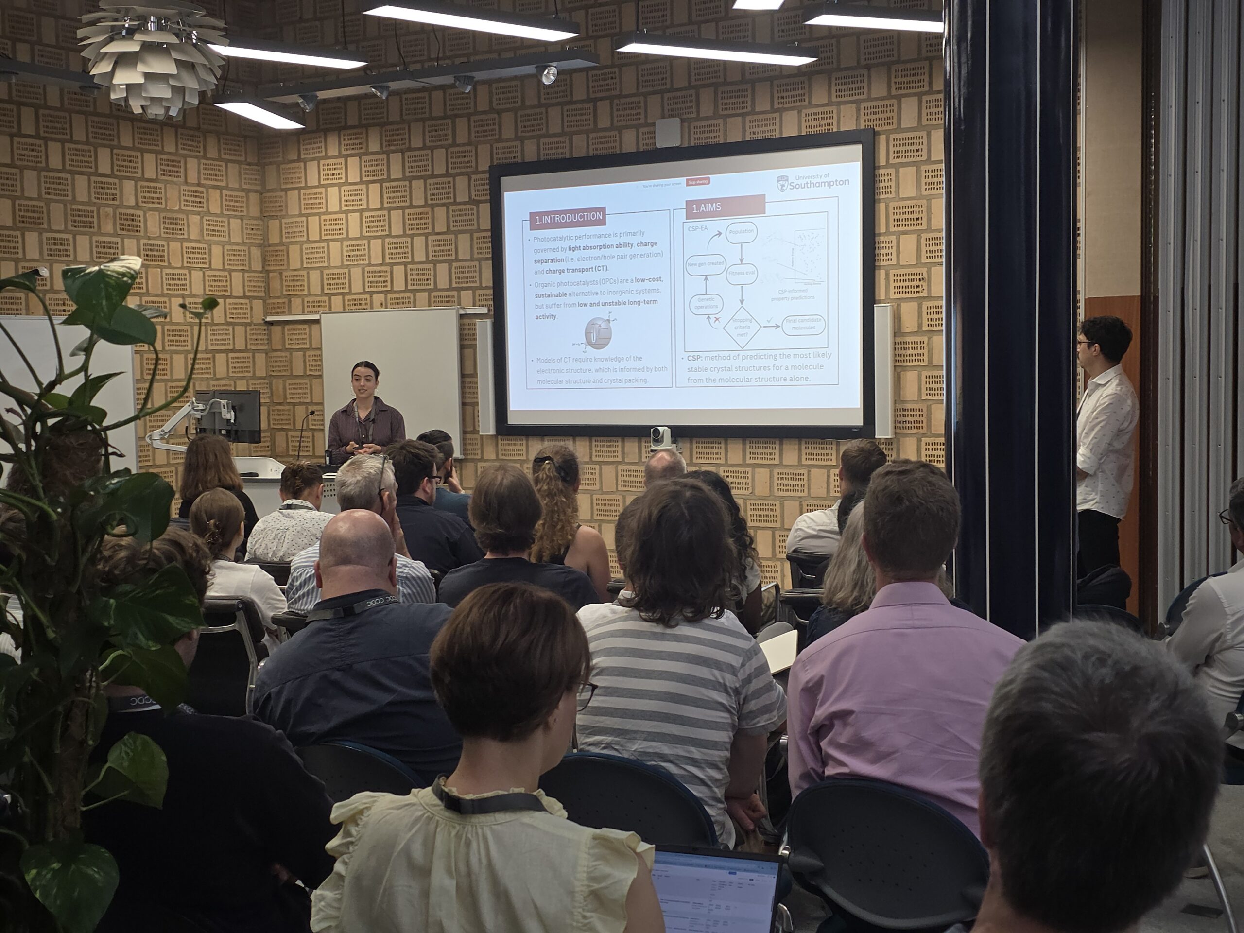 A sponsored PhD student shares research progress with fellow students, supervisors, and CCDC staff during a presentation at the annual Science Day meeting.