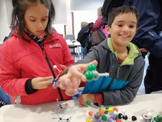 Some of the young attendees enjoying learning about crystals